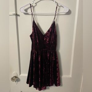 Urban Outfitters velvet wine colored romper (S). Never worn with tags still on!!